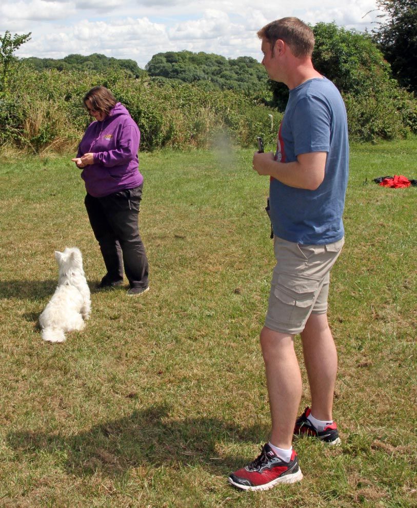 Clair with a client training their dog