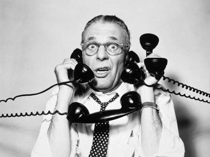 phones Man with 4 phones all ringing and the same time, stressed giving out too much free advice